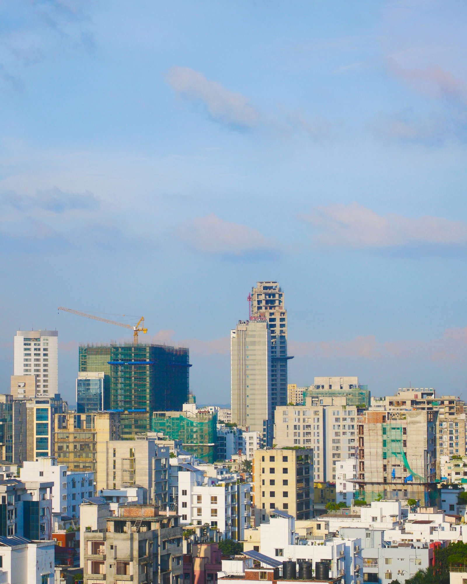 New buildings and construction cranes on the Dhaka skyline