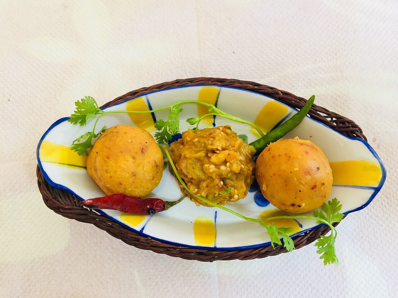 Aloo bhorta: balls of spiced mashed potato with dried chillies