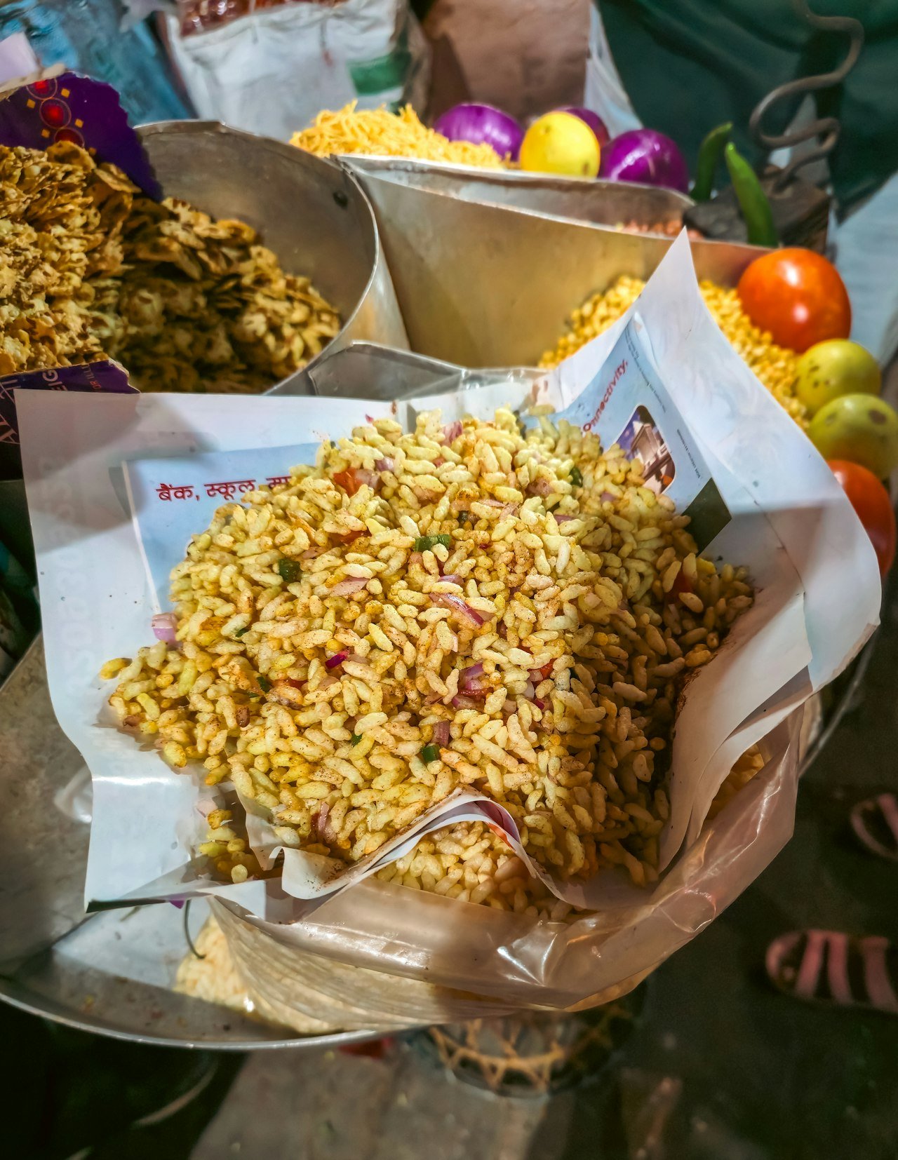 Jhal muri, spicy puffed rice, in a paper cone